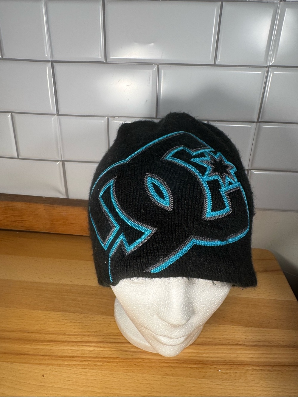 DC Youth Black Beanie with Teal Logo Stitching